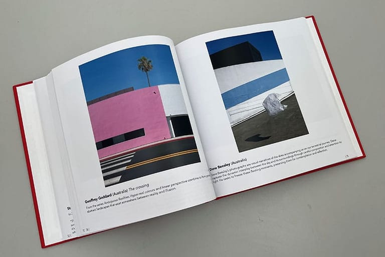 An open Pre order: 2023 Head On Photo Awards catalogue with a photo of a pink building.